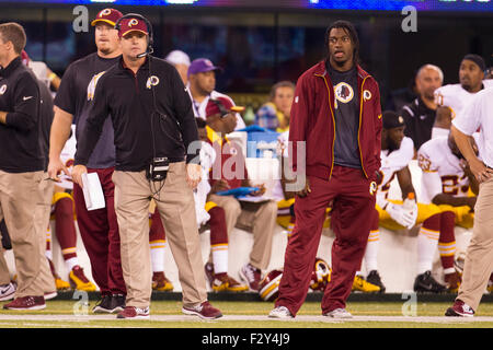 September 24, 2015, Washington Redskins head coach Jay Gruden looks on while quarterback Robert Griffin III (10) is near by during the NFL game between the Washington Redskins and the New York Giants at MetLife Stadium in East Rutherford, New Jersey. The New York Giants won 32-21. Christopher Szagola/CSM Stock Photo