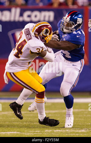 New York Giants safety Trenton Thompson (39) greets New England