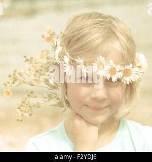 Textured Retro Portrait of Pretty Little Blonde Girl with a Crown of Daisies Stock Photo