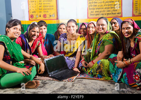 indian rural Villager group crowds womans Laptop Education Stock Photo