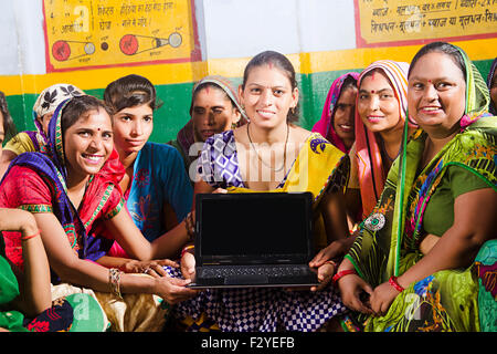 indian rural Villager group crowds womans Laptop Education Stock Photo