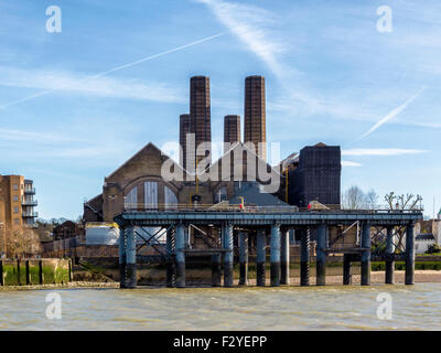 Greenwich Power station and old coal jetty pier on the river Thames, London Borough of Greenwich, South East London, UK Stock Photo