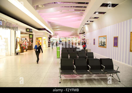 LONDON - SEPTEMBER 5TH: Departure lounge at heathrow airport on September the 5th, 2015 in London, england, uk. Heathrow is one  Stock Photo
