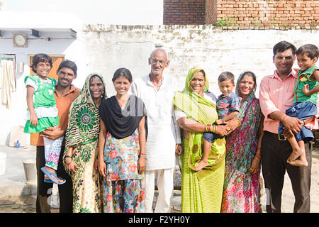 indian group crowds rural villagerJoint Family home standing Stock Photo