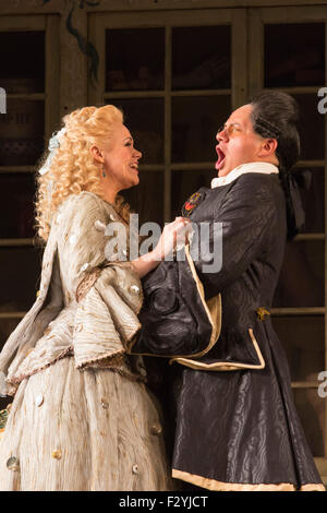 London, UK. 25/09/2015. Kathryn Rudge as Rosina with Eleazar Rodriguez as Count Almaviva. Dress rehearsal for the Gioachino Rossini opera The Barber of Seville at the London Coliseum. The English National Opera production is directed by Jonathan Miller with Peter Relton being the Revival Director. 10 performances from 28 September 2015. The performance on 19 October 2015 will be broadcast live to cinemas across the UK and Eire, as well as selected cinemas worldwide. Cast: Eleazar Rodriguez as Count Almaviva, Morgan Pearse as Figaro, Kathryn Rudge as Rosina, Andrew Shore as Doctor Bartolo, Barn Stock Photo