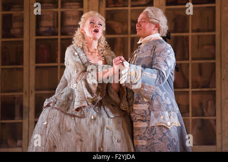 London, UK. 25/09/2015. Kathryn Rudge as Rosina with Eleazar Rodriguez as Count Almaviva. Dress rehearsal for the Gioachino Rossini opera The Barber of Seville at the London Coliseum. The English National Opera production is directed by Jonathan Miller with Peter Relton being the Revival Director. 10 performances from 28 September 2015. The performance on 19 October 2015 will be broadcast live to cinemas across the UK and Eire, as well as selected cinemas worldwide. Cast: Eleazar Rodriguez as Count Almaviva, Morgan Pearse as Figaro, Kathryn Rudge as Rosina, Andrew Shore as Doctor Bartolo, Barn Stock Photo