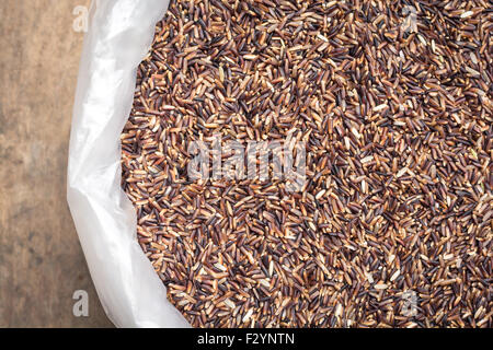 raw rice in plastic bag Stock Photo