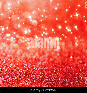 Red defocused glitter background with copy space Stock Photo