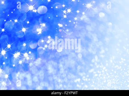 Blue defocused glitter background with copy space Stock Photo