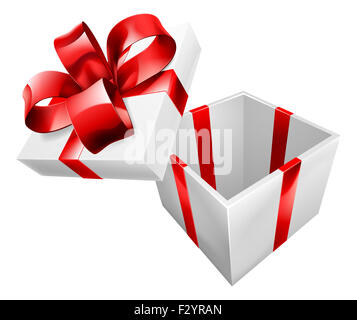 An open gift or present wrapped with a red bow ribbon Stock Photo