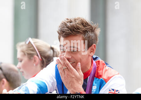 Diver Tom Daley reacts during the Olympic and Paralympic Parade of athletes through central London Stock Photo
