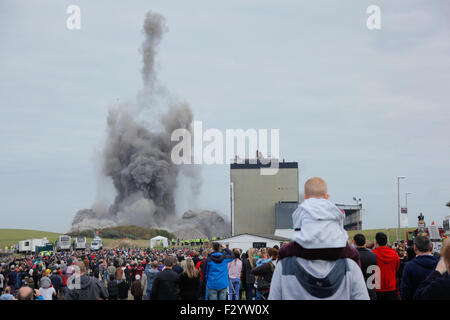 Cockenzie, Scotland, UK. 26th Sep, 2015. Cockenzie Power Station, East Lothian, Scotland, UK. The two Chimney's standing 149m tall being demolished at 12 noon on 26 September 2015 Credit:  L Hamilton/Alamy Live News Stock Photo