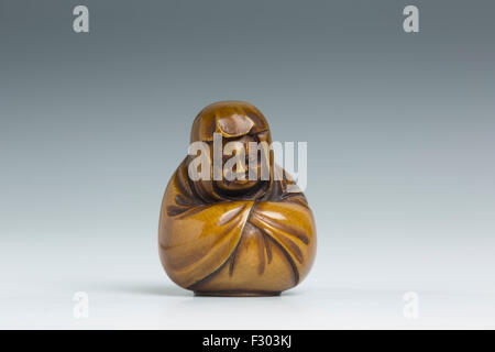 Japanese Ivory Netsuke depicting Daruma, the father of Zen Buddism Stock Photo