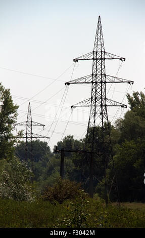 Old and Rusty Electric Poles in Eastern Europe Stock Photo