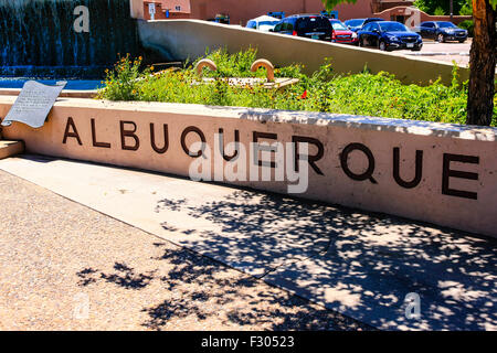Stone wall with the city name of Albuquerque founded by Don Francisco Cuervo y Valdis. This New Mexico City found on Route 66 in Stock Photo