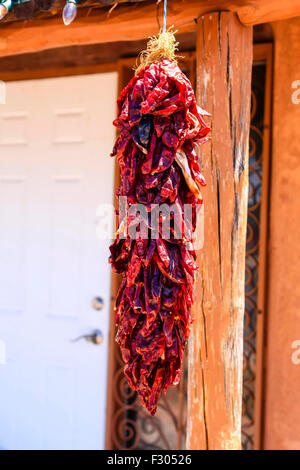 A dried red chilli Risto hanging outside of a home in Albuquerque in New Mexico Stock Photo