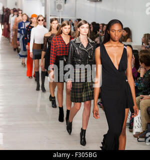 London, UK, 26th September 2015. The show finale at the 'Trends' catwalk at London Fashion Weekend 2015. The show reveals key AW15 trends, with designers including Carven, Marc by Marc Jacobs, J Brand, 'T' by Alexander Wang, Iro, Kenzo, Joseph, McQ Alexander McQueen and See by Chloé, as well as high street brands. LFW is this year held at Chelsea's Saatchi Gallery