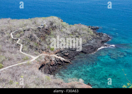 Hiking trail on west side of San Cristobal Island, viewed from Cerro Tijeretas (Frigate Bird Hill), Galapagos Islands Stock Photo