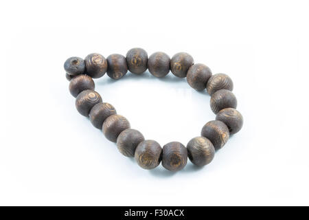 Wooden beads on white background Stock Photo