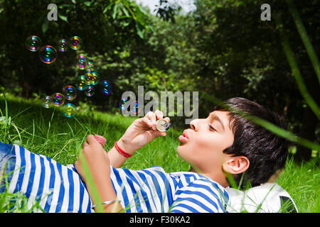 Casual Attire; Casual Clothes; Courtyards; Facial Expression; Head and Shoulders; One people; One person; One Person Only; Playfulness; Tranquil Scene; Travel Destination T Shirt; T Shirts; Tshirt; Tshirts; T-Shirts; T-Shirt; Asia; Asian; Asians; India; I Stock Photo