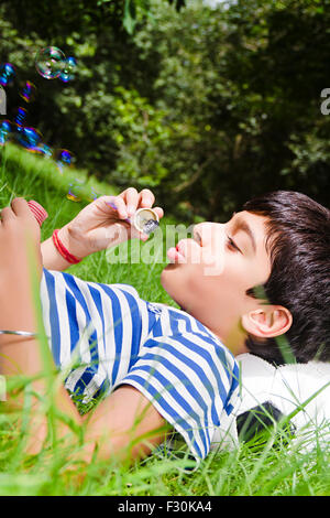 Casual Attire; Casual Clothes; Courtyards; Facial Expression; Head and Shoulders; One people; One person; One Person Only; Playfulness; Tranquil Scene; Travel Destination T Shirt; T Shirts; Tshirt; Tshirts; T-Shirts; T-Shirt; Asia; Asian; Asians; India; I Stock Photo