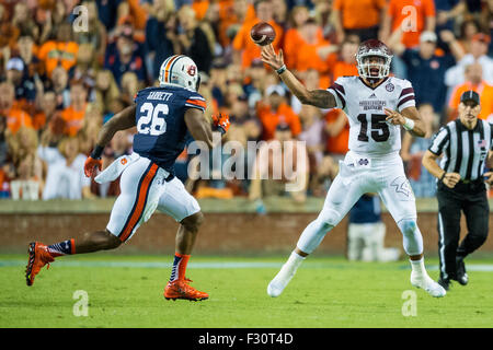 Mississippi State Quarterback Dak Prescott Hands The Ball Off To 