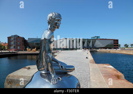 He or Han, a 2m tall sculpture in the harbour  of Elsinore in front of the Culture Yard, a male equivalent to the Little Mermaid Stock Photo