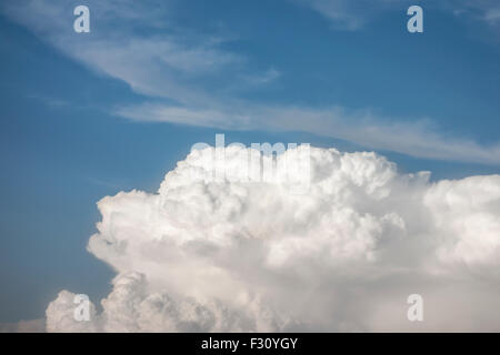 Puffy anfd white clouds with blue sky Stock Photo