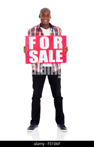 handsome African American man holding a for sale sign isolated on white Stock Photo