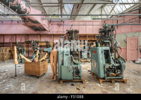 Socks knitting machines in an abandoned spinning mill Stock Photo