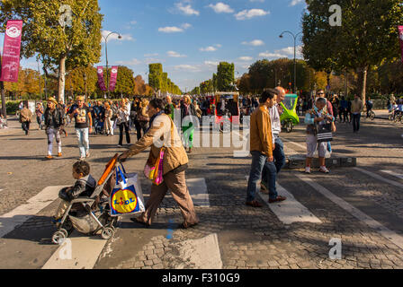Paris, France. People Crossing Street, Participating at Environmental Street Event, 'Journée Sans Voiture', (Day Without C-ars) , Avenue des Champs-Elyees, Stock Photo