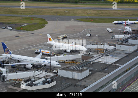 A Virgin Atlnatic A320, Ryanir B737, Iberia Express A320 and an United B757 on the apron at Edinburgh Airport summer 2015 Stock Photo