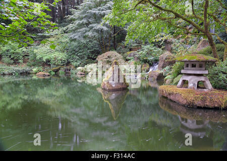 Stone Lantern by the Pond at Portland Japanese Garden Stock Photo