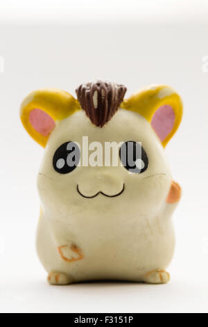 Japanese plastic Anime Hamtaro hamster cartoon character, Jingle, from the Ham-Ham gang. Anime figure against white background. Stock Photo