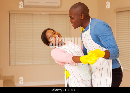 lovely African American couple dancing in their new home Stock Photo