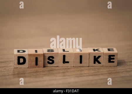 written in wooden cubes on a desk Stock Photo
