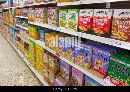 Breakfast cereal display on shelves in a Sainsburys supermarket, UK ...