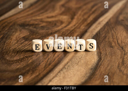 EVENTS word background on wood blocks Stock Photo