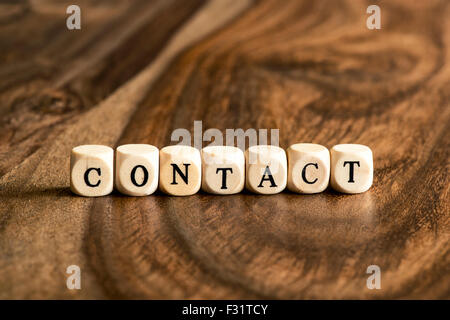 CONTACT word background on wood blocks Stock Photo
