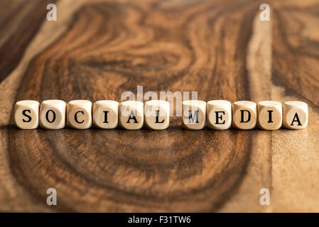 SOCIAL MEDIA word background on wood blocks Stock Photo