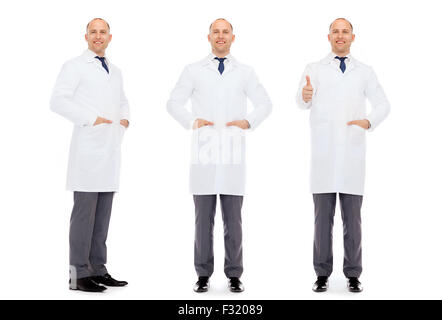 happy doctors with stethoscope showing thumbs up Stock Photo