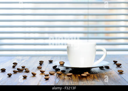 cup of coffee on the kitchen table Stock Photo