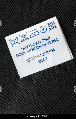 label in principles garment - dry clean only cool iron on reverse - care washing symbols and instructions Stock Photo