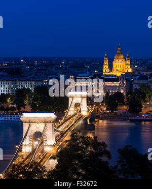 Budapest Dusk shot from Royal Palace of Szechenyi chain bridge Gresham Palace Hungary River Danube Saint Stephen's Basilica Stock Photo