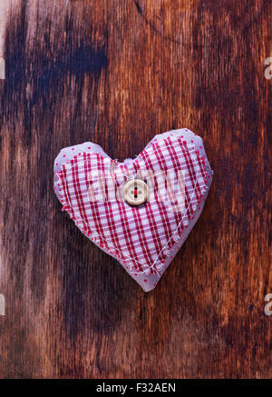 Love hearts on vintage wood, violet hearts Stock Photo