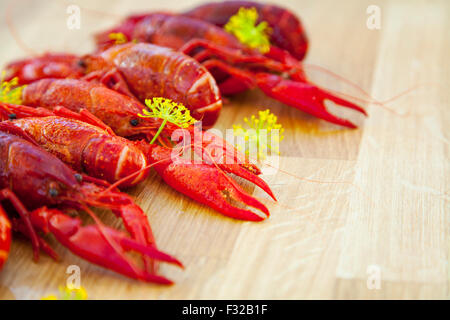 Image of crayfish on a wooden board. Stock Photo