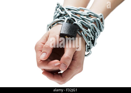 Social theme: hands tied a metal chain on a white background Stock Photo