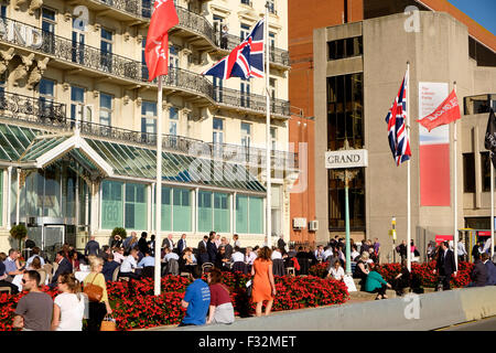 Brighton, UK. 28th September, 2015. Delegates relaxing in the sun outside Labour Party conference at the Brighton Centre Credit:  Scott Hortop/Alamy Live News Stock Photo