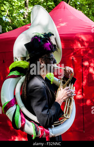 Beorma Border Morris dancer in costume with his sousaphone Stock Photo