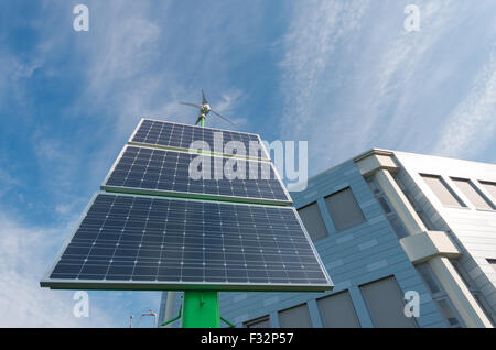 solar panel with small wind turbine on top Stock Photo